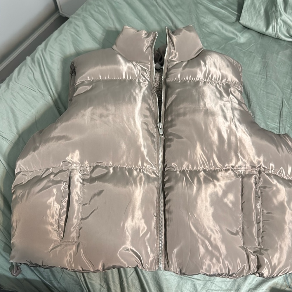 woman’s sleeveless puffer jacket